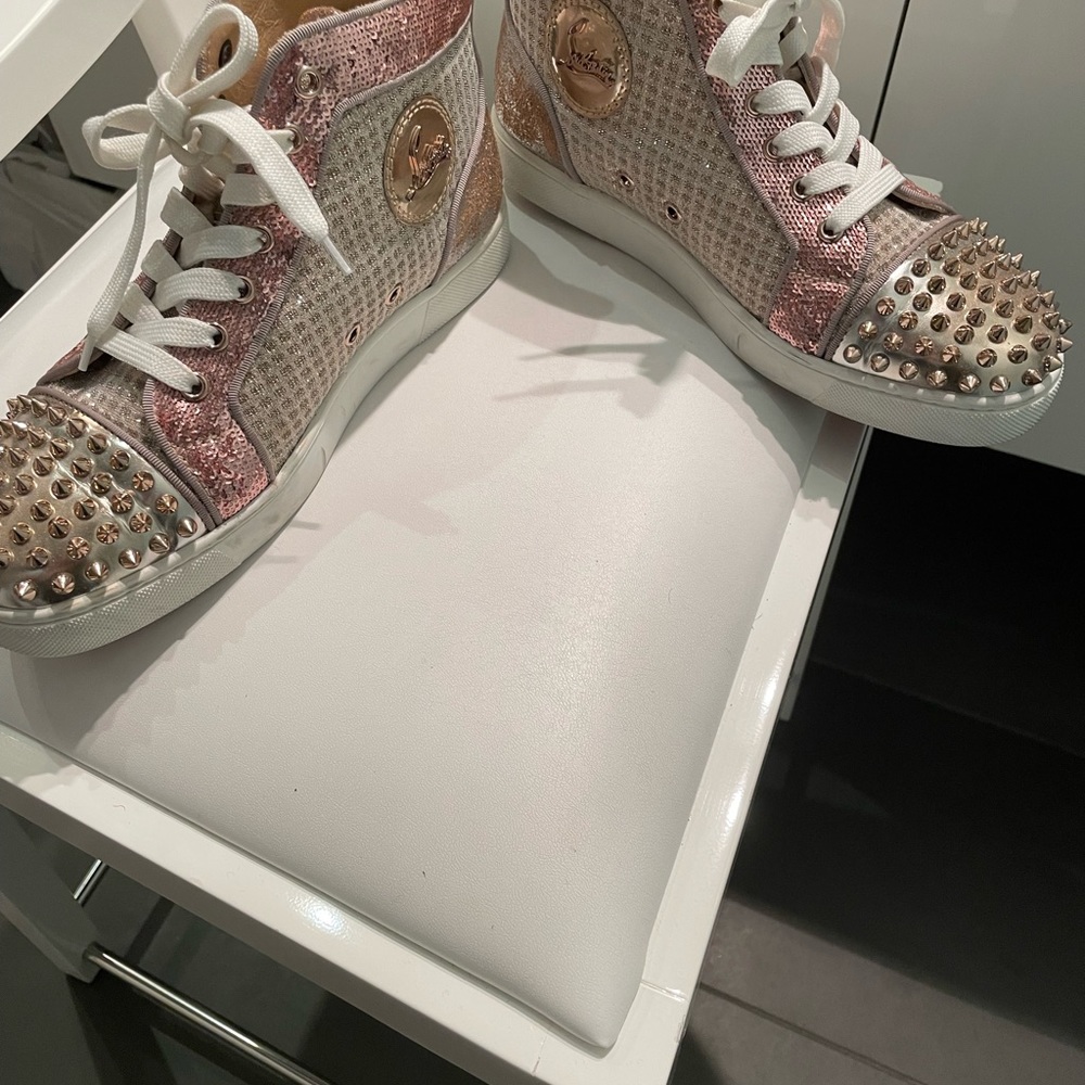 Christian Louboutin spiked high tops.  Great condition!  Barely worn.  Size 39